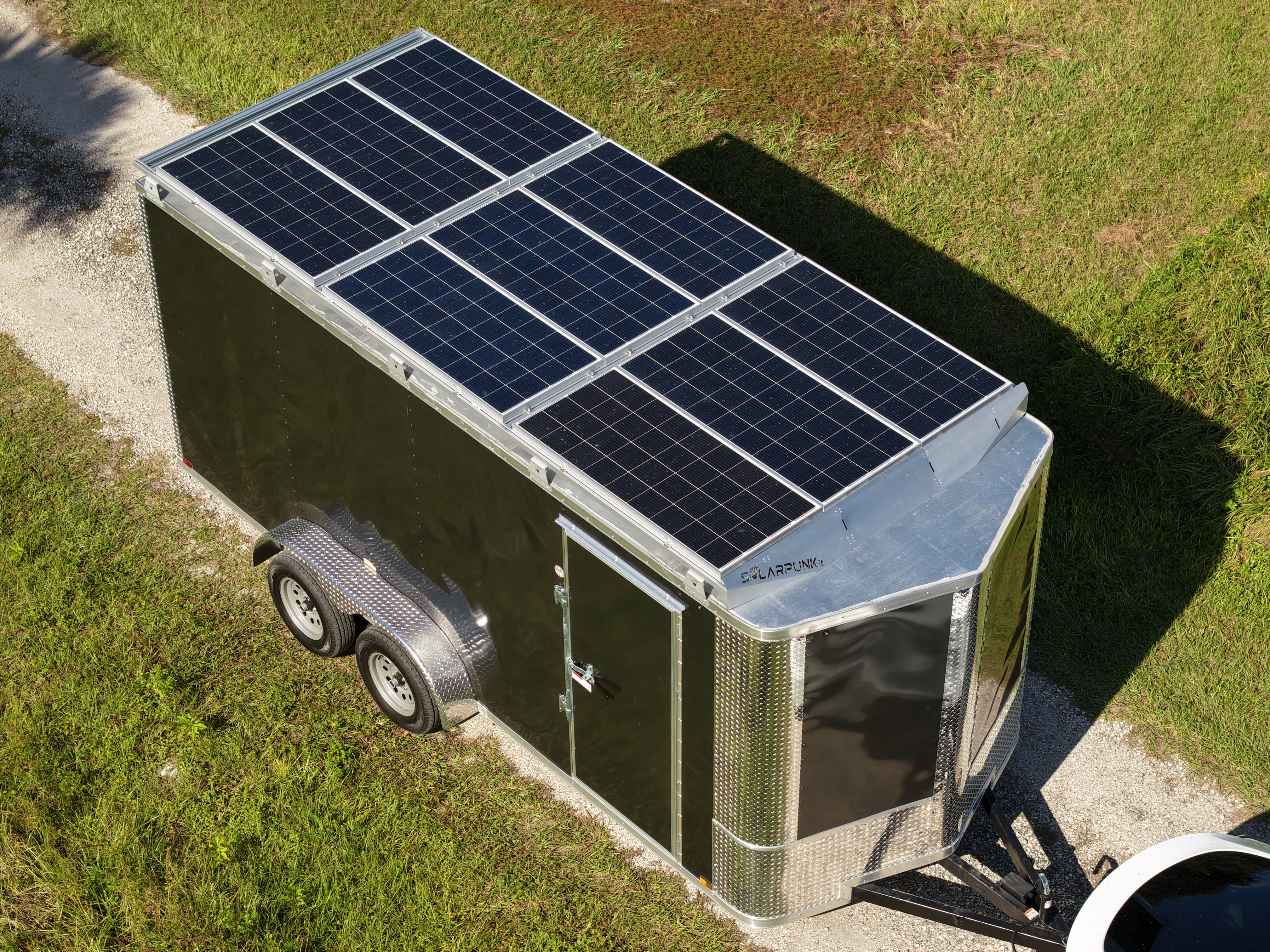 Trailer with solar panels on top.
